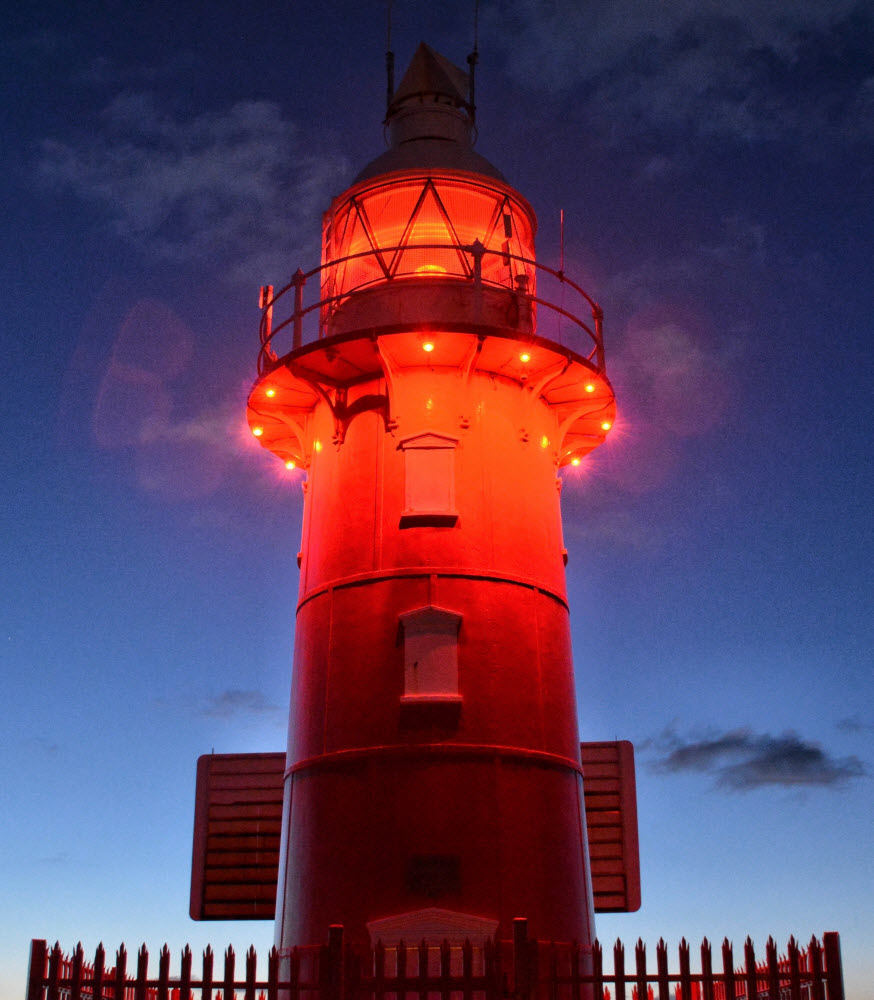 Glowing North Mole lighthouse crop web